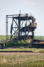 A narrow gauge barney pushed cars up the ramp